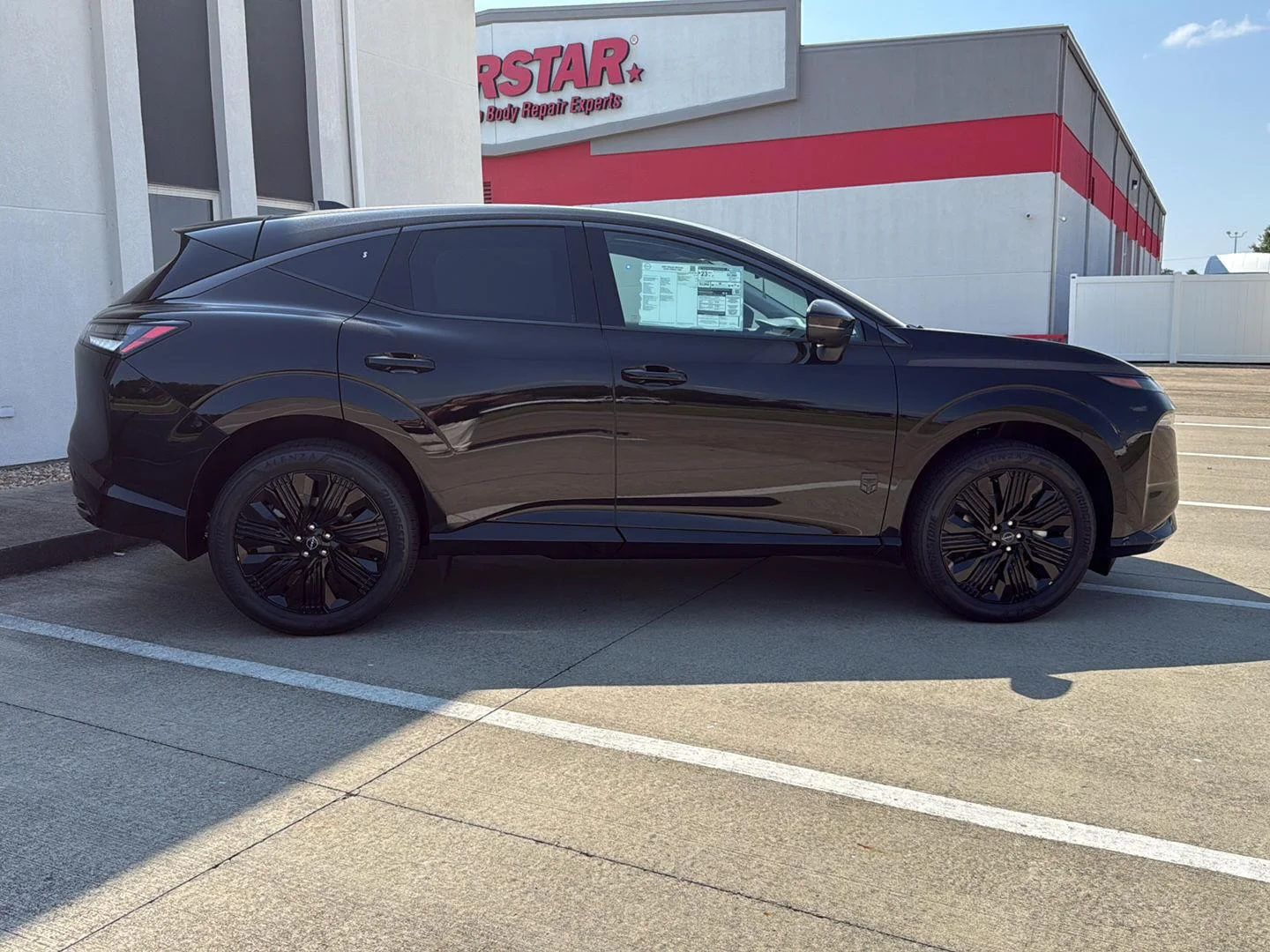 New 2027 Super Black Nissan SL image 8