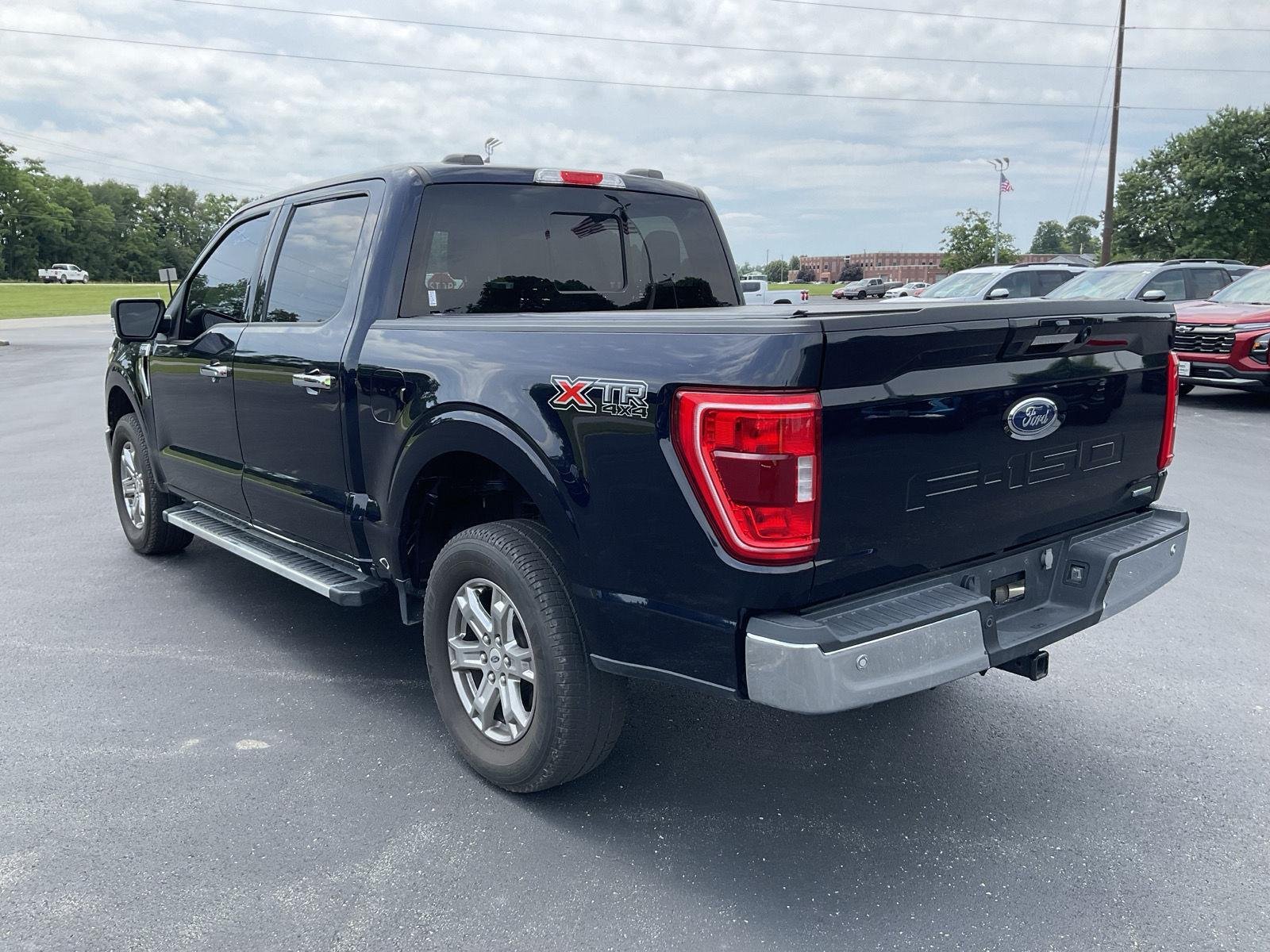 Used 2023 Antimatter Blue FORD XLT 4WD SUPERCREW 5.5