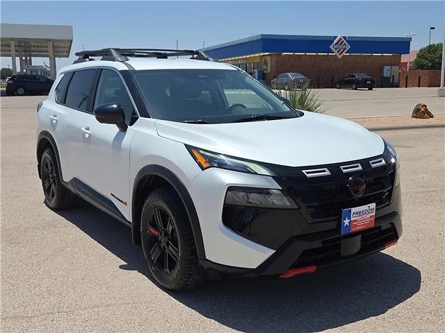 Used 2025 Everest White Pearl Nissan Rock Creek All-Wheel Drive image 6