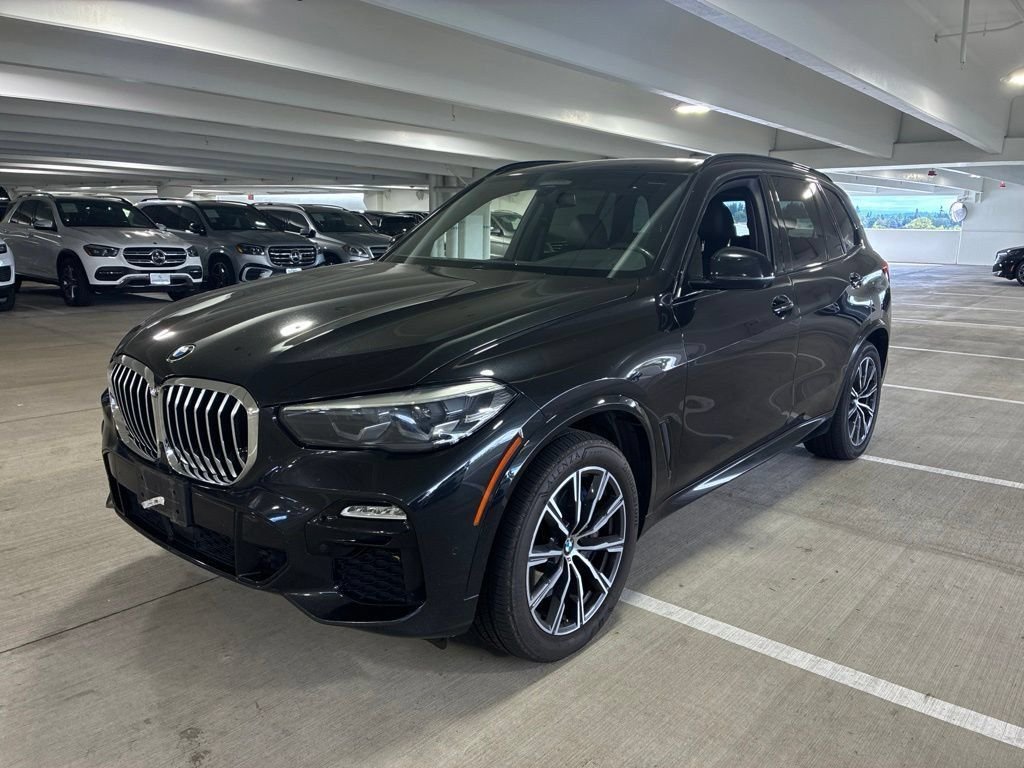 Used 2020 Black Sapphire Metallic BMW xDrive40i image 1