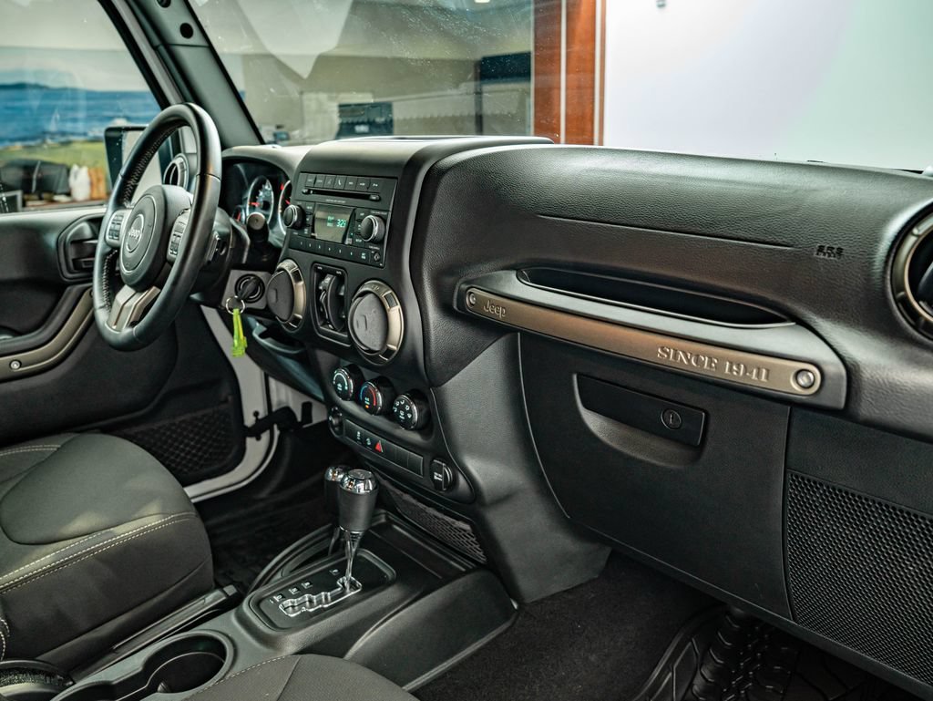 Used 2018 Bright White Clearcoat Jeep Unlimited Sport image 34