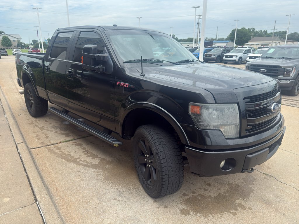 Used 2013 Tuxedo Black Metallic Ford FX4 image 4