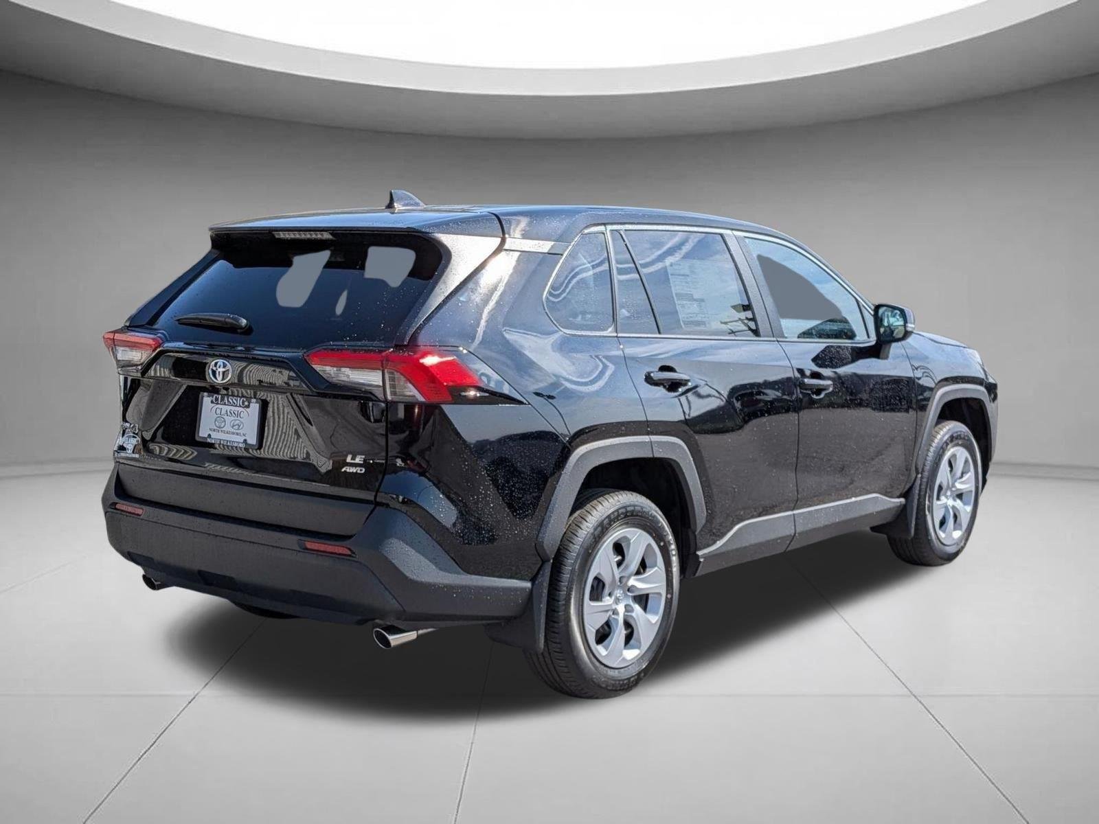 Used 2025 Midnight Black Metallic Toyota LE image 5