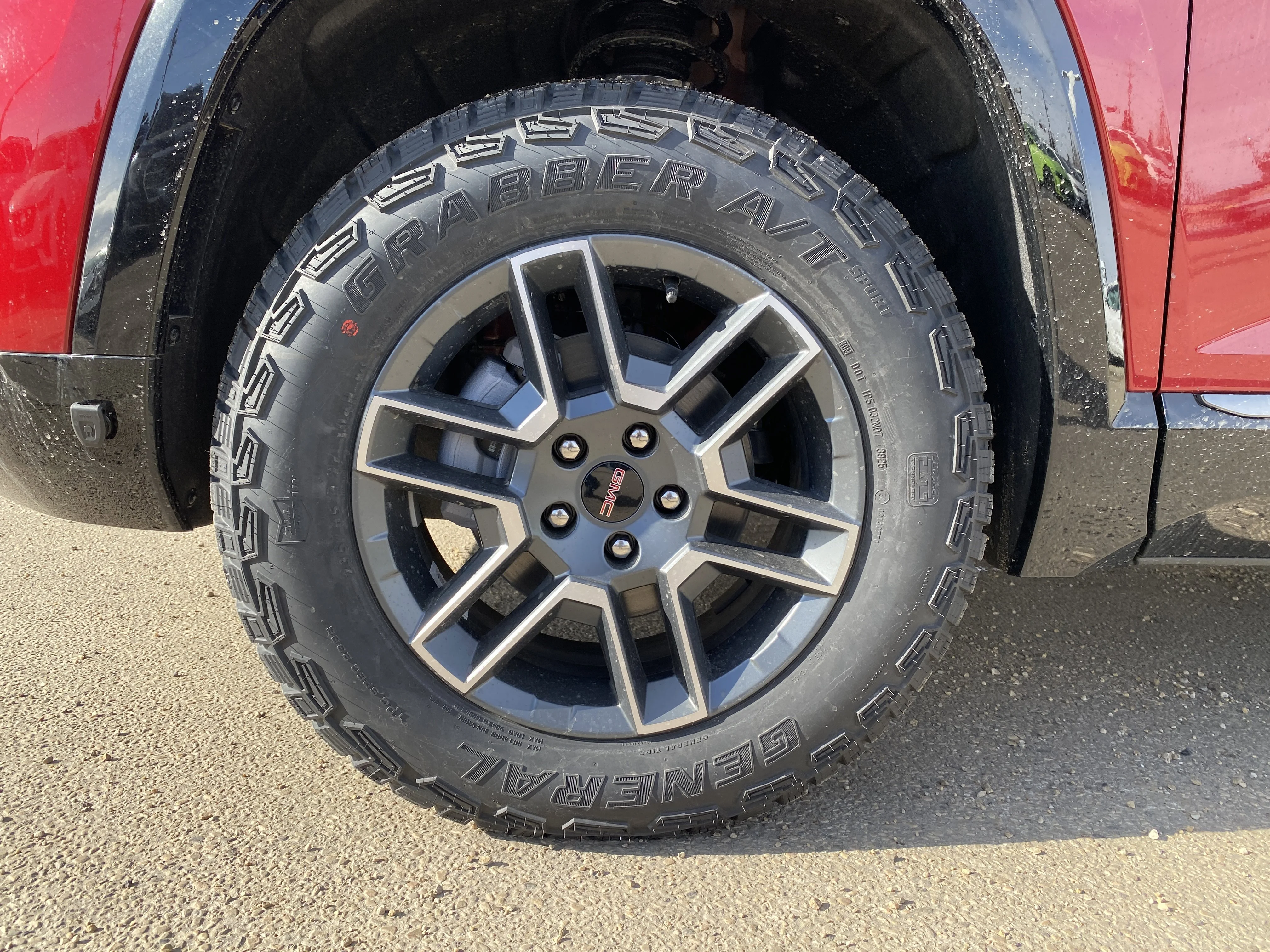 New 2026 VOLCANIC RED TINTCOAT GMC AWD AT4 image 12