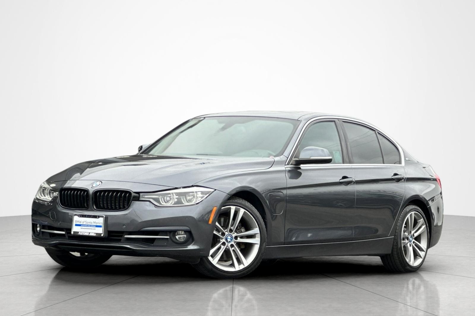 Used 2017 Mineral Gray Metallic BMW 330e iPerformance image 1