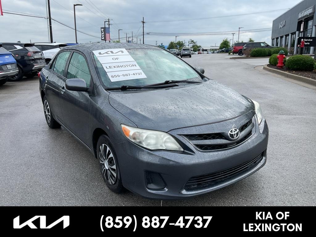 Used 2011 Magnetic Gray Metallic Toyota LE image 1