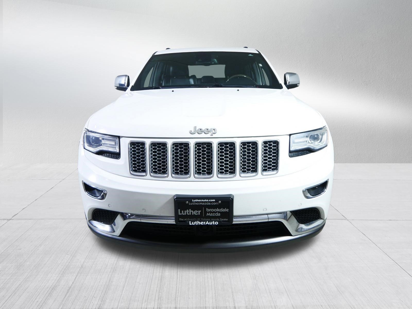 Used 2014 Jeep Grand Cherokee Summit with VIN 1C4RJFJG7EC233463 for sale in Brooklyn Center, Minnesota