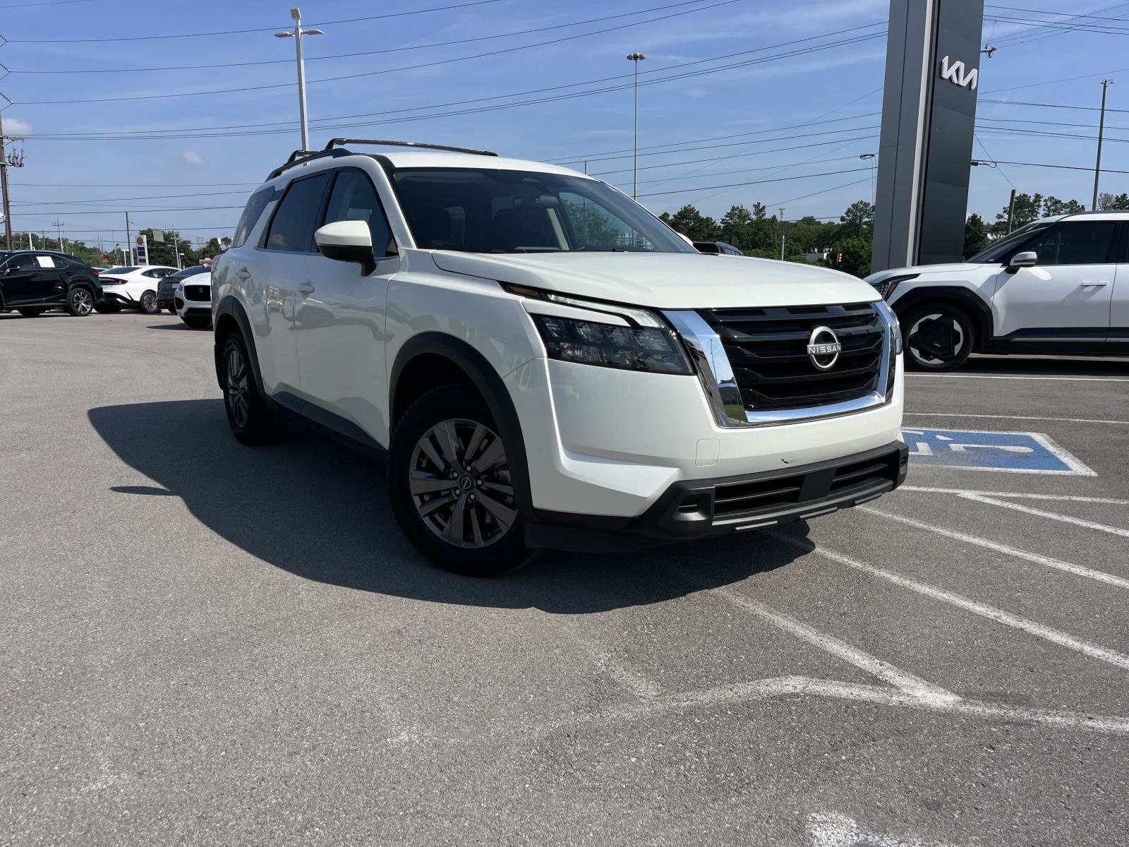 Used 2023 Pearl White Tricoat Nissan SV image 1