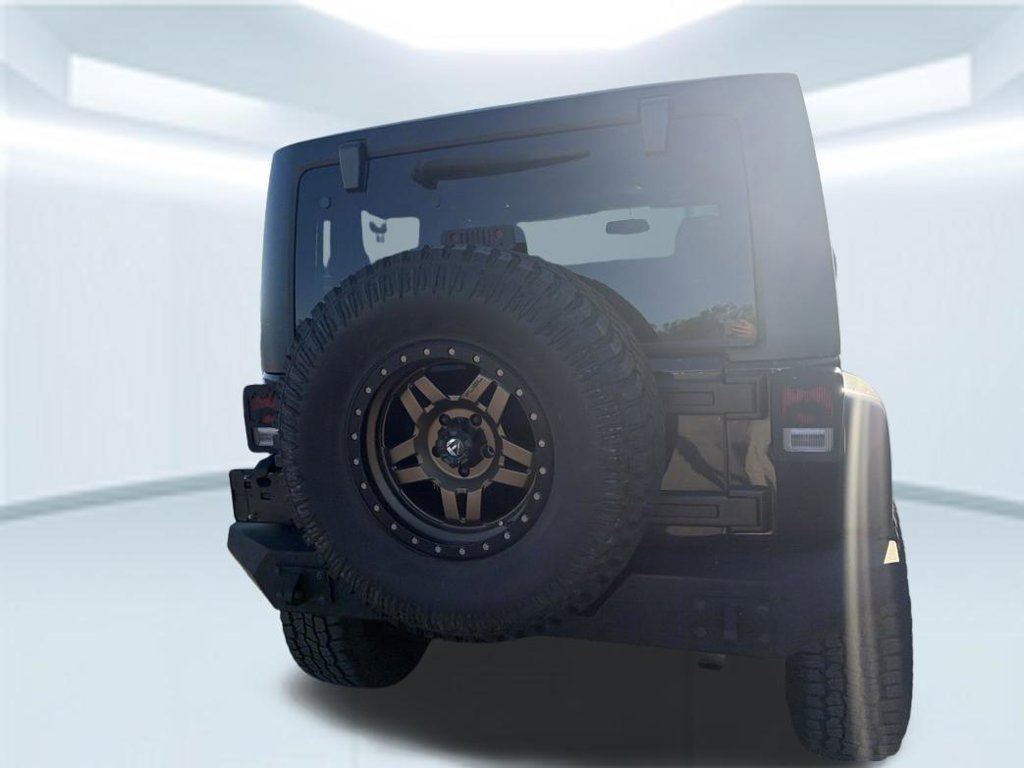 Used 2015 Black Clearcoat Jeep Sahara image 12