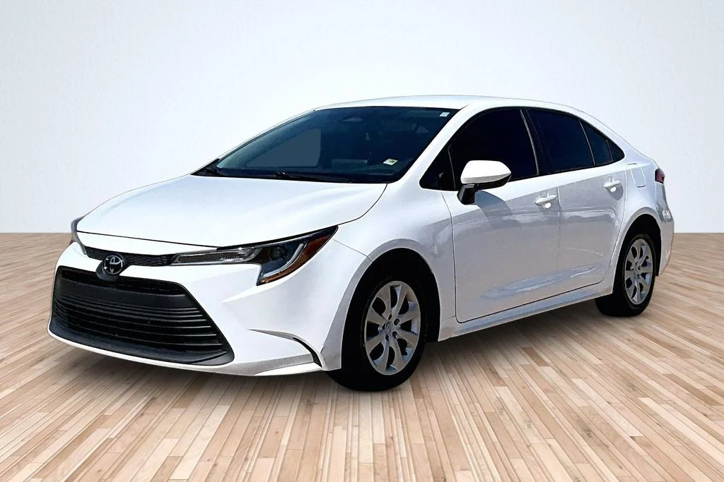 Used 2024 White Toyota LE image 1
