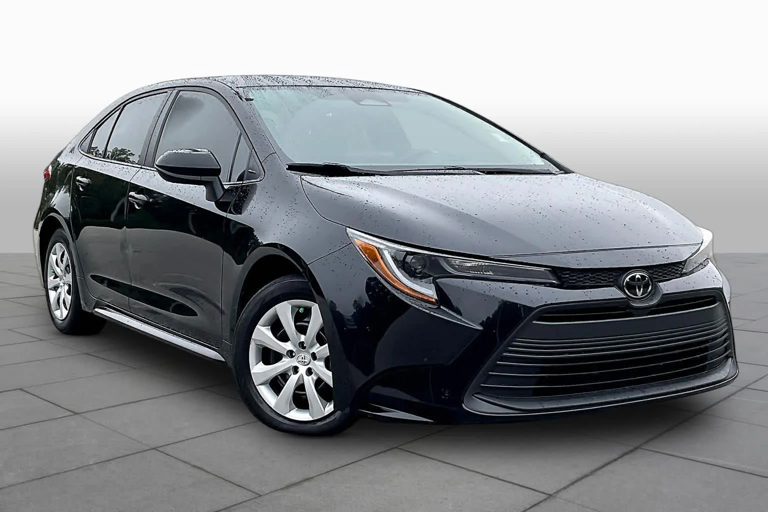 Used 2025 Midnight Black Metallic Toyota LE image 3