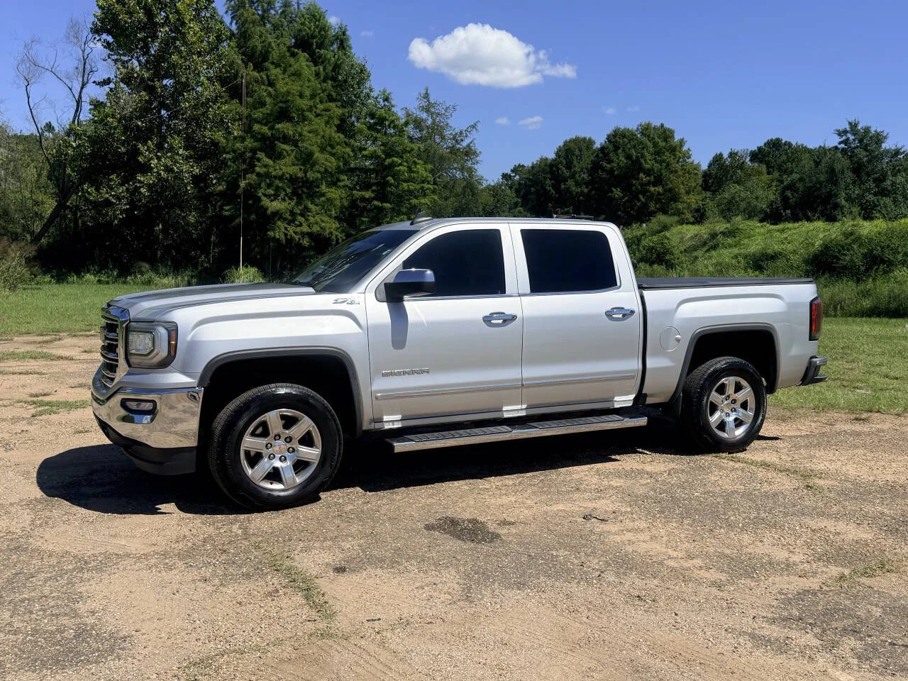 Used 2017 Silver GMC SLT 4x4 4dr Crew Cab 5.8 ft. SB image 1