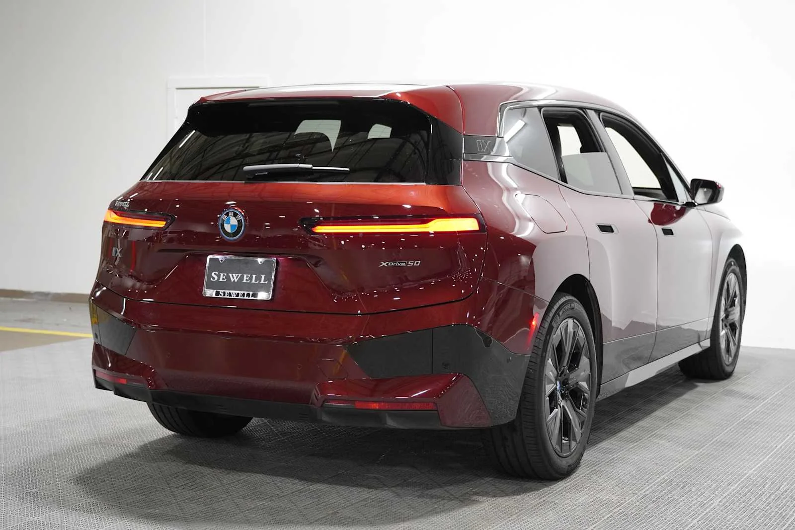 Certified Used 2024 Aventurin Red Metallic BMW xDrive50 image 4