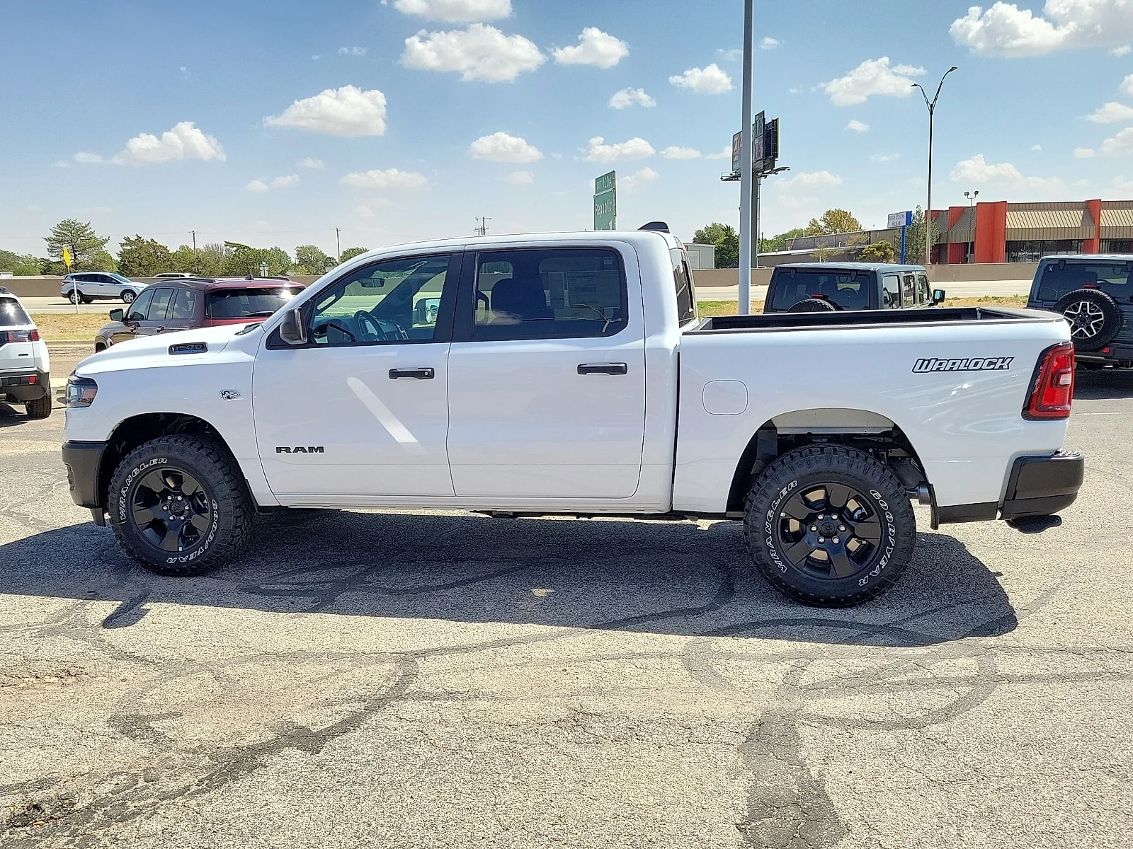 New 2026 Bright White Ram WARLOCK CREW CAB 4X4 5