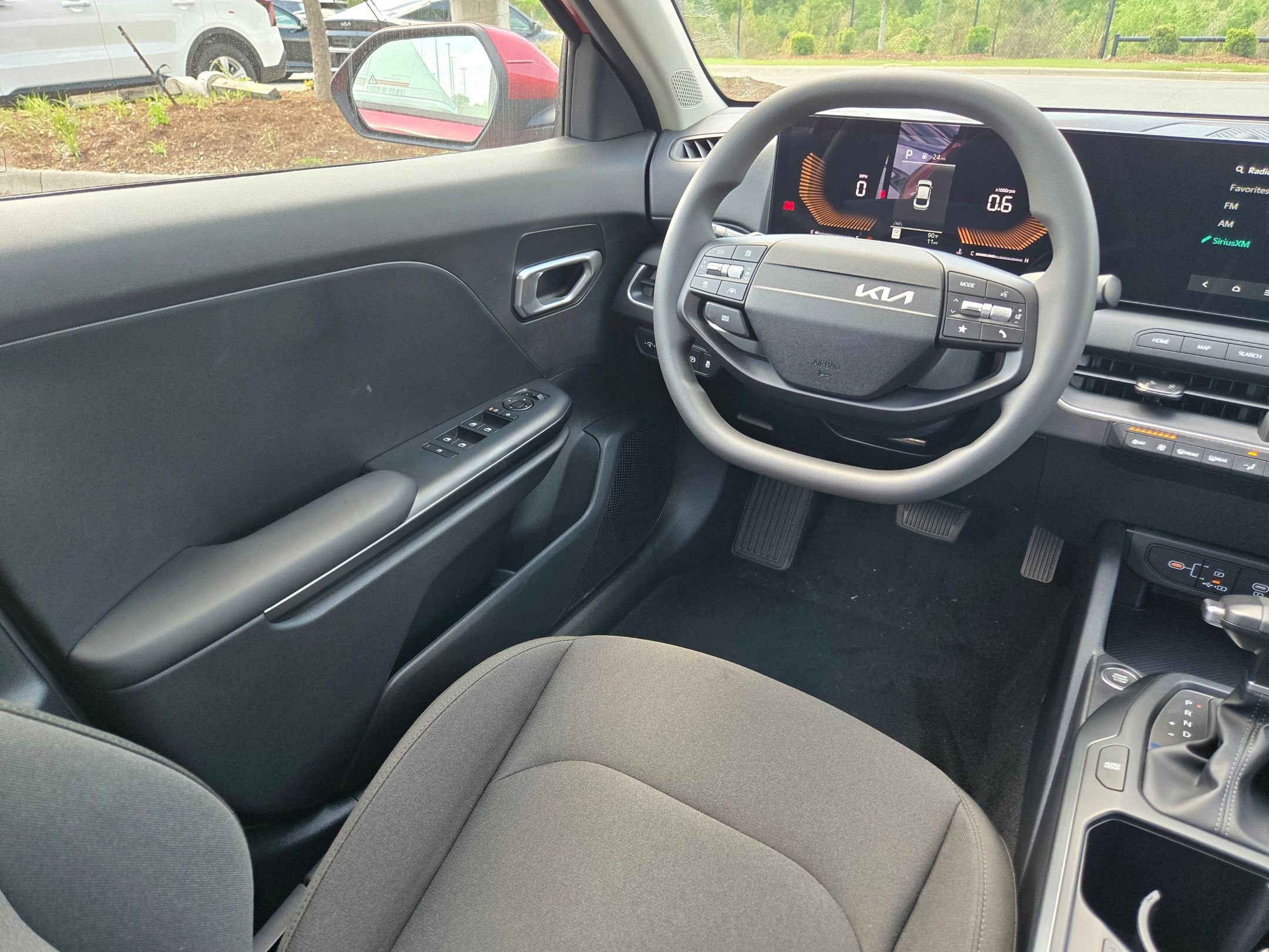 New 2026 Currant Red Kia LXS image 9