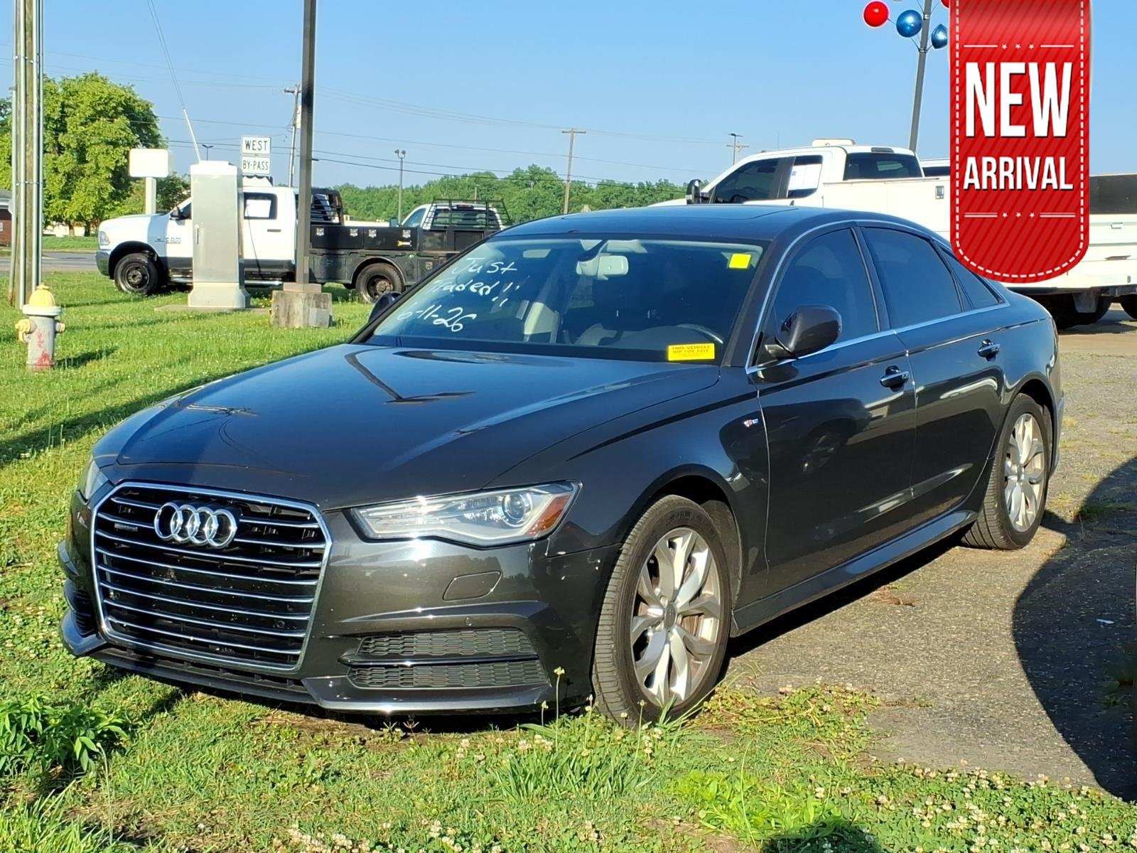 Used 2017 Oolong Gray Metallic AUDI PREMPLS image 1