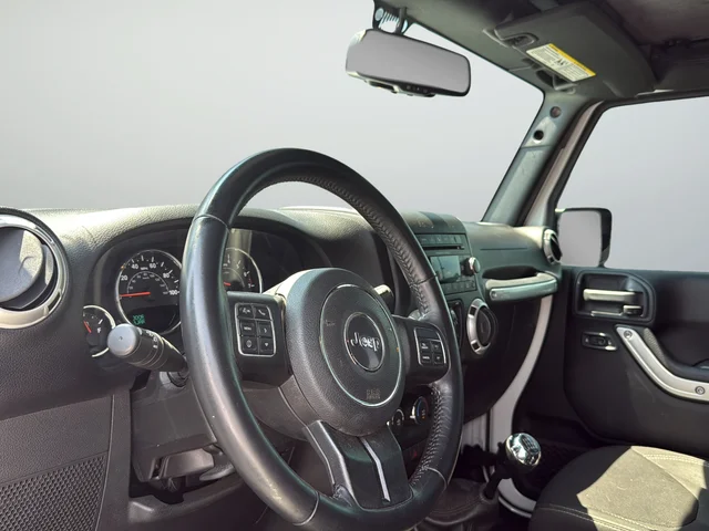 Used 2017 White Jeep Unlimited Sahara image 11