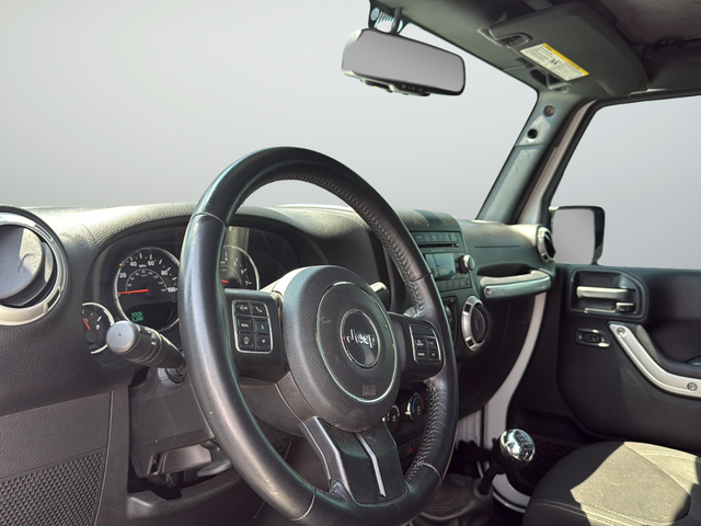 Used 2017 White Jeep Unlimited Sahara image 11