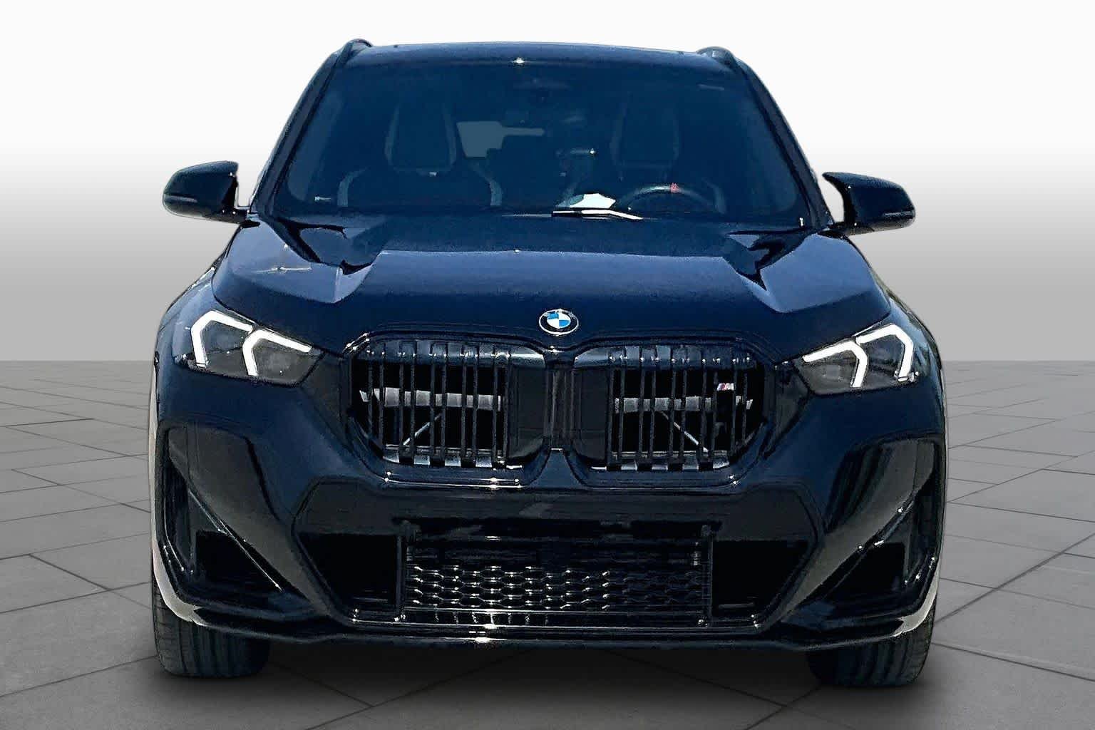 Used 2026 Black Sapphire Metallic BMW M35i image 3