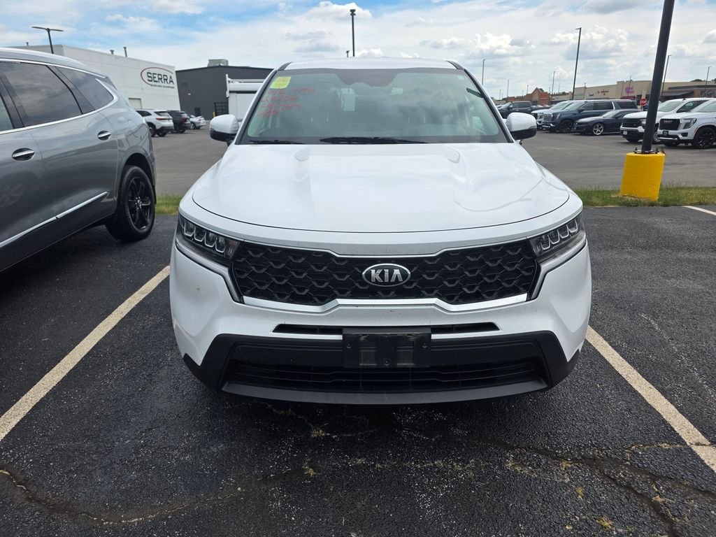 Used 2021 Glacial White Pearl Kia LX image 1