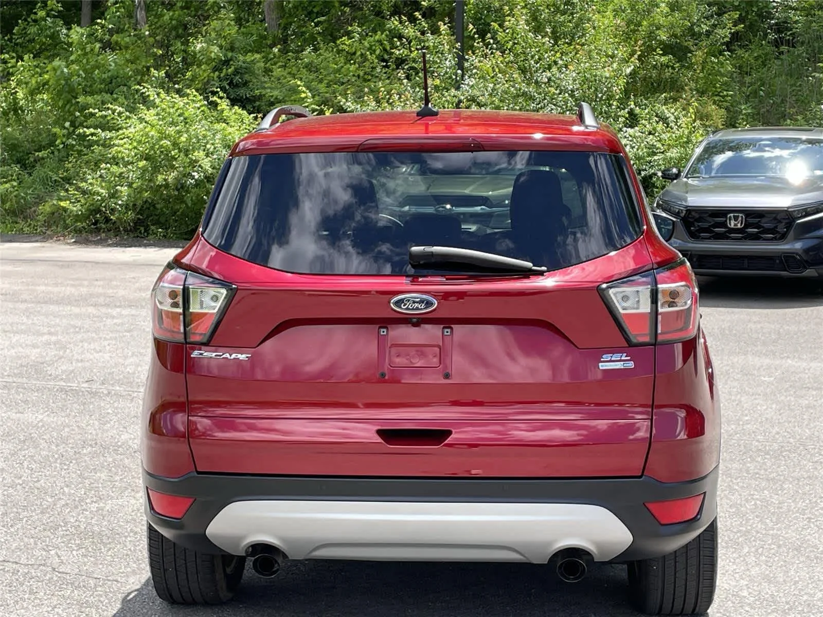 Used 2018 Ruby Red Metallic Tinted Clearcoat Ford SEL image 4