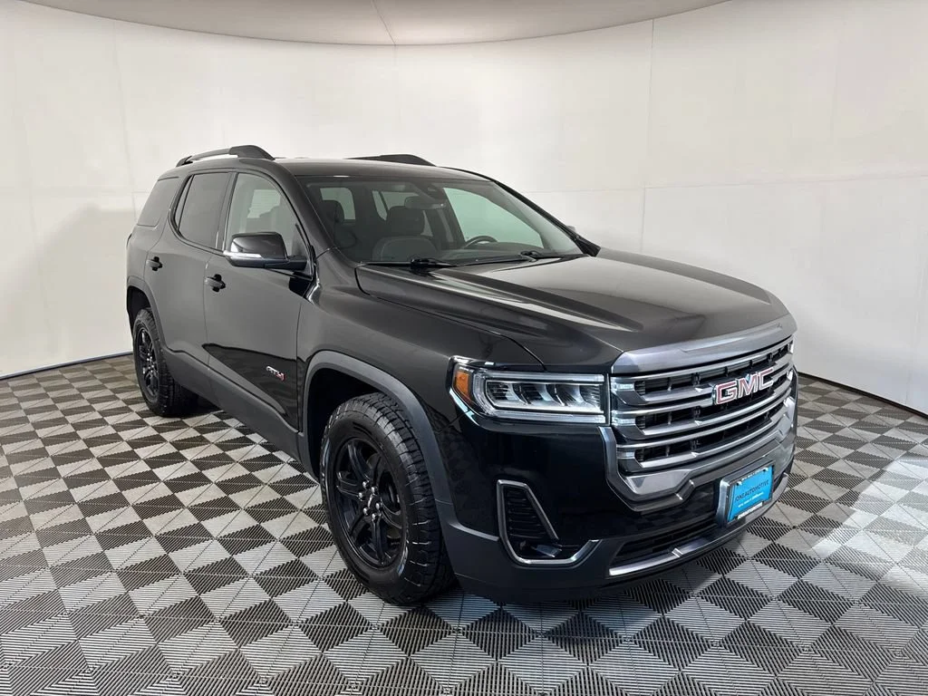 Used 2023 EBONY TWILIGHT METALLIC GMC AT4 image 4