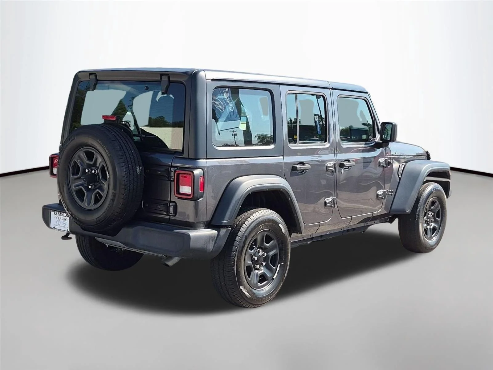 Used 2022 Granite Crystal Metallic Clearcoat Jeep Unlimited Sport image 5