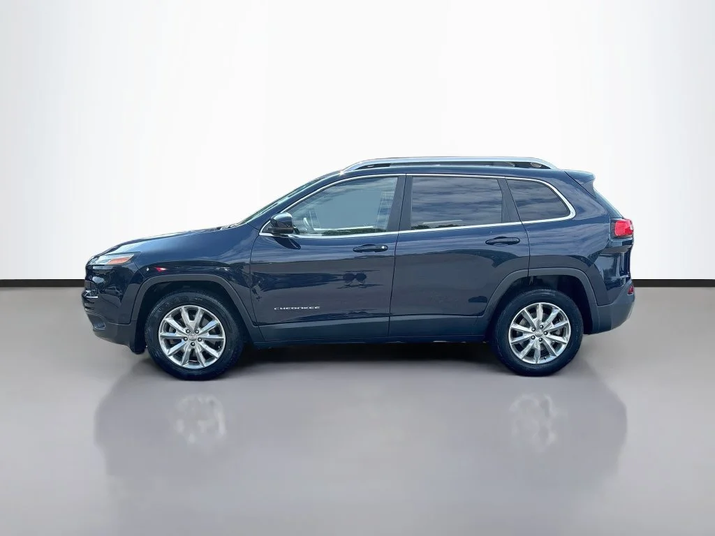 Used 2016 True Blue Jeep Limited image 4
