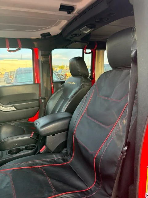 Used 2015 Red Jeep Unlimited Sahara image 11