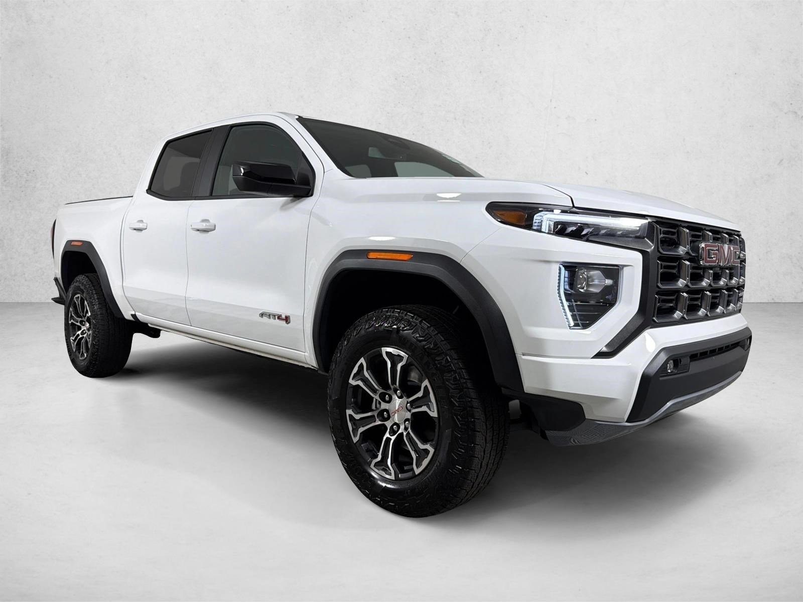 Used 2025 Summit White GMC 4WD AT4 image 1