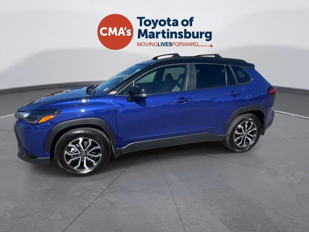 Used 2025 Blue Crush Metallic w/Jet Black Roof Toyota Hybrid SE image 2