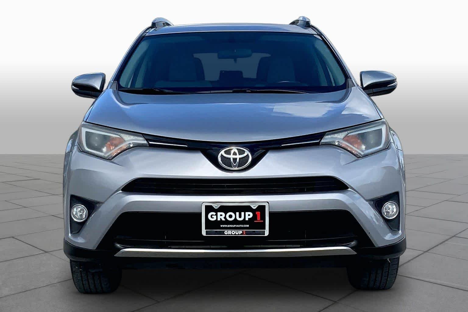 Used 2016 Silver Sky Metallic Toyota XLE image 4