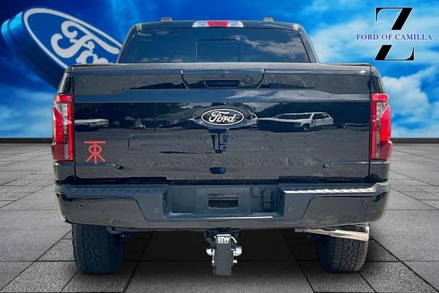 Used 2025 Agate Black Metallic Ford XLT image 4