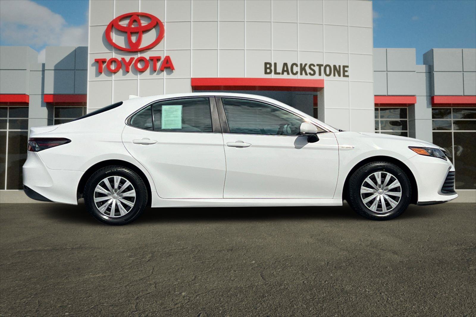 Certified Used 2021 Super White Toyota Hybrid LE image 2