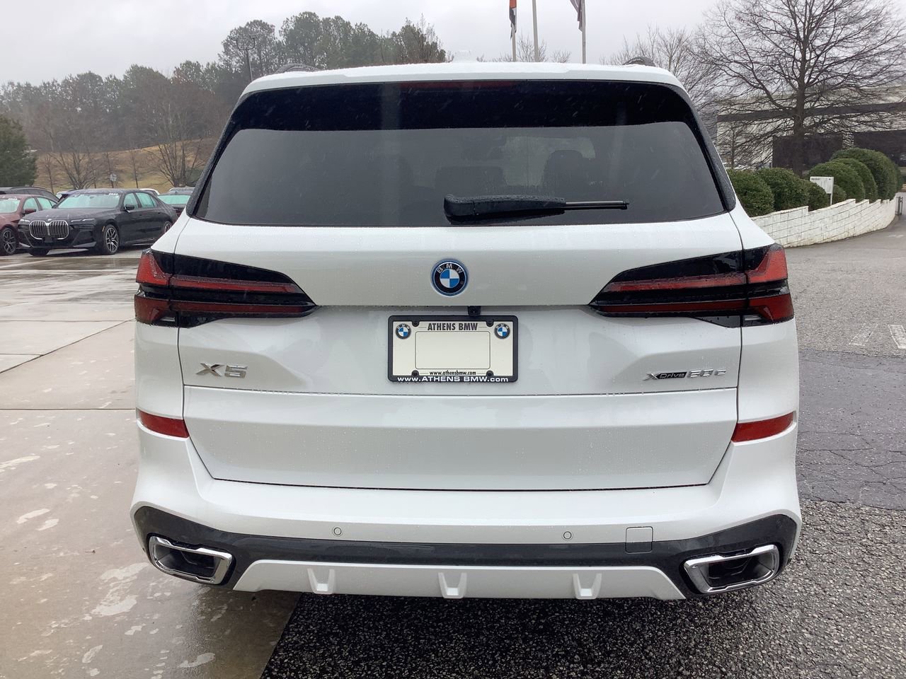 Used 2026 Mineral White Metallic BMW xDrive50e image 13