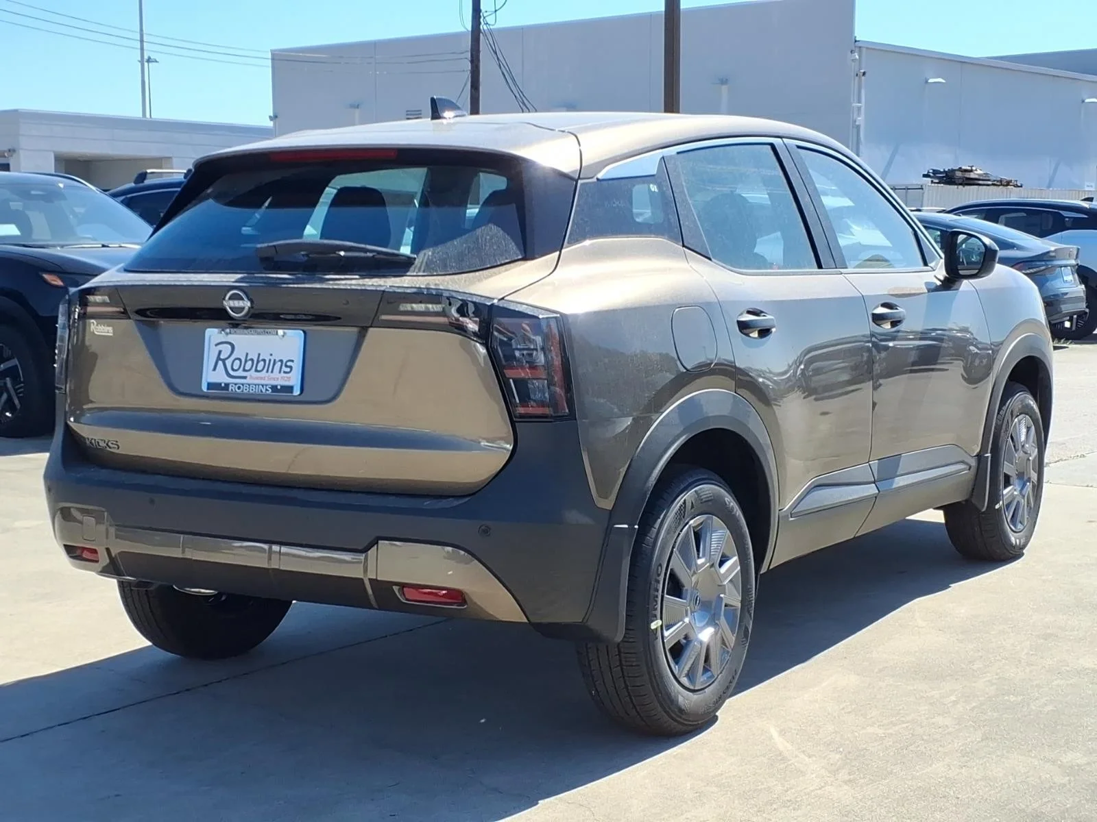 2026 Nissan Kicks S Brown at Robbins Nissan
