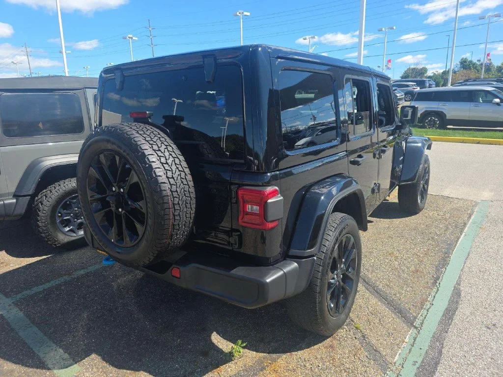 Used 2024 Black Jeep Sahara 4xe image 2