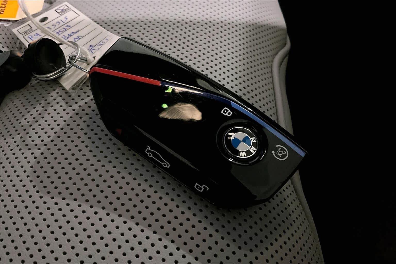 Used 2024 Marina Bay Blue Metallic BMW  image 13