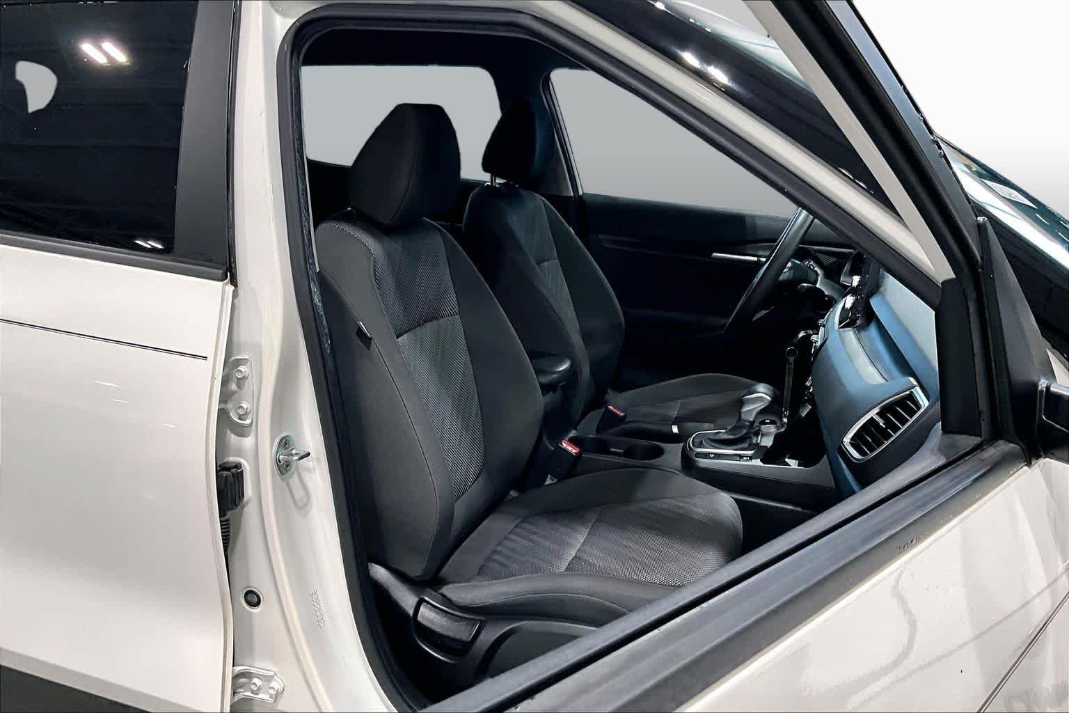 Used 2023 Snow White Pearl Kia LX image 9