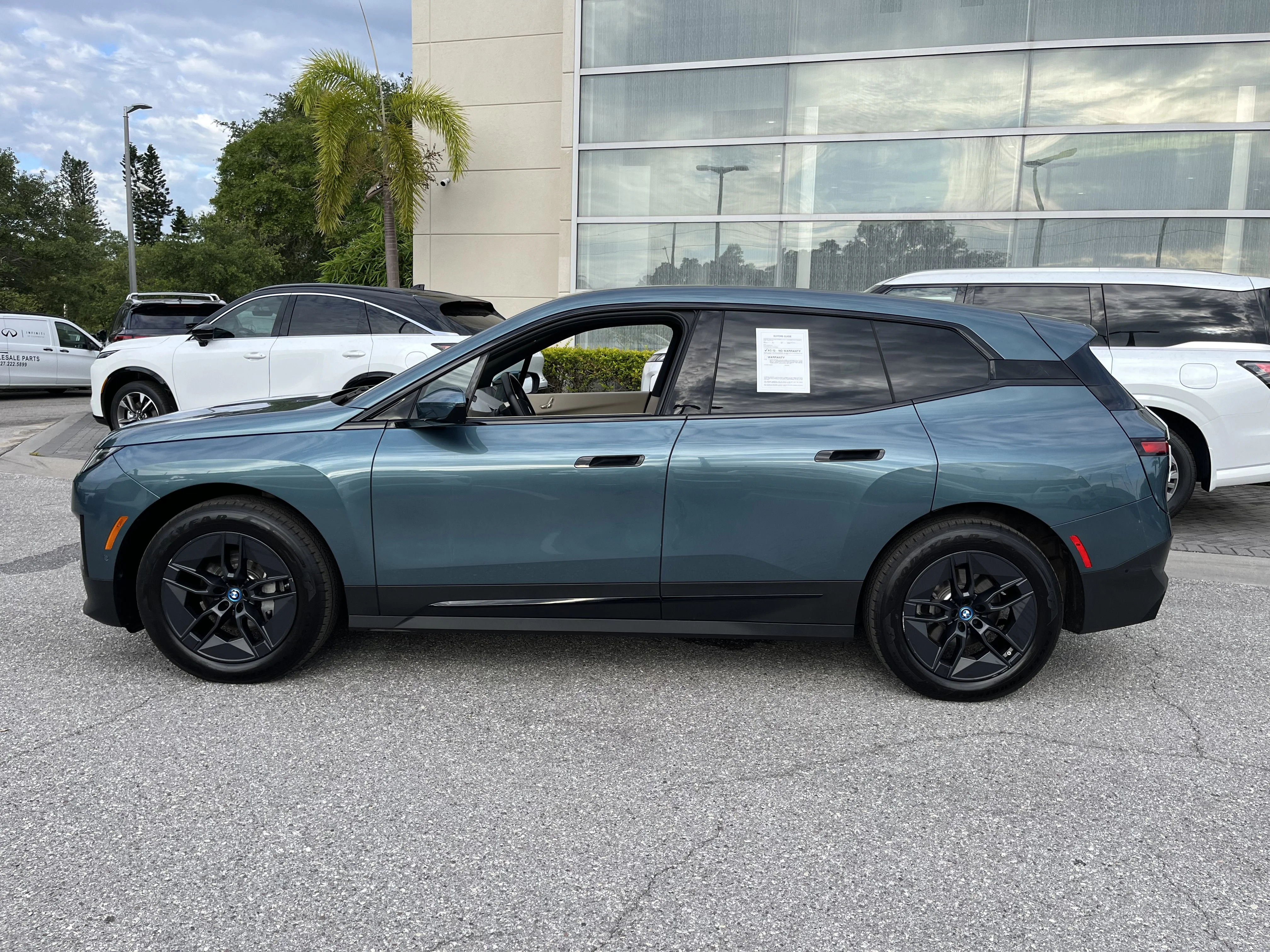 Used 2025 Blue Ridge Mountain Metallic BMW xDrive50 image 6