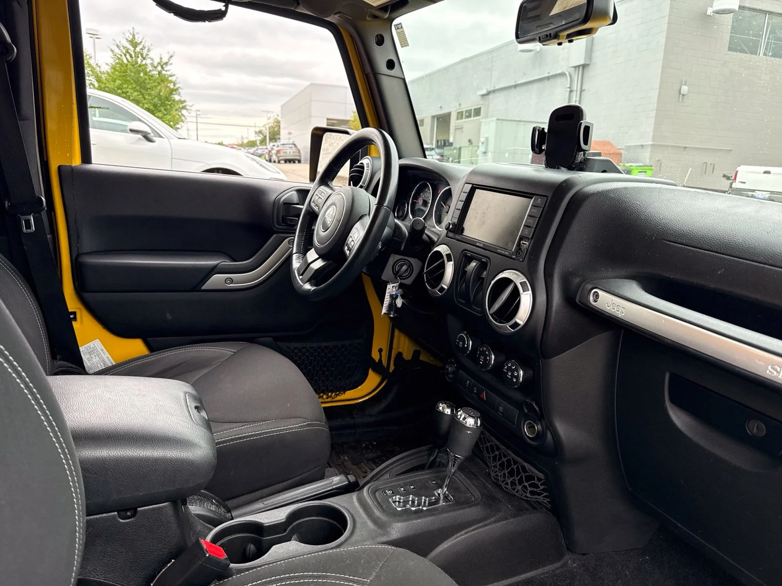 Used 2015 Baja Yellow Clearcoat Jeep Sahara image 15