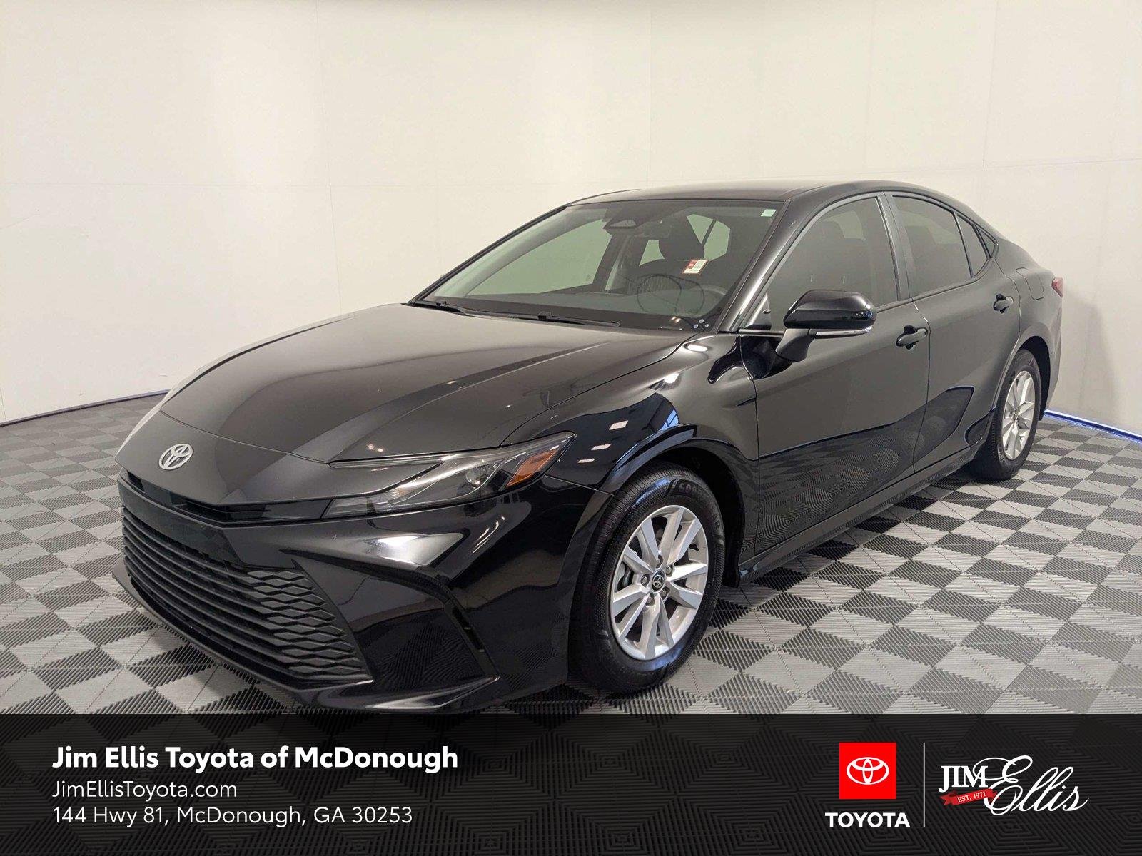 Used 2025 Midnight Black Metallic Toyota LE image 1