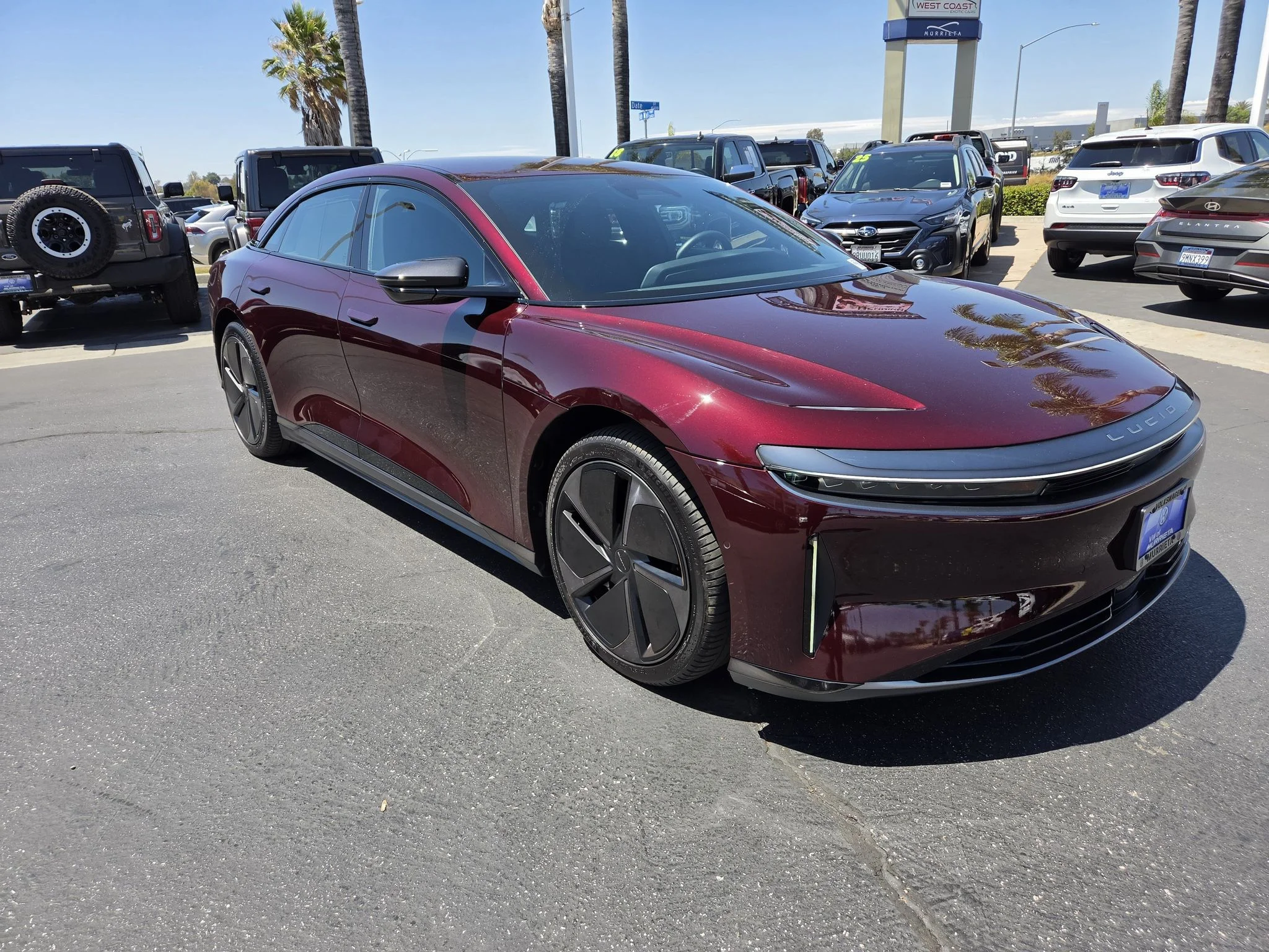Used 2024 Zenith Red Metallic Lucid Touring image 1
