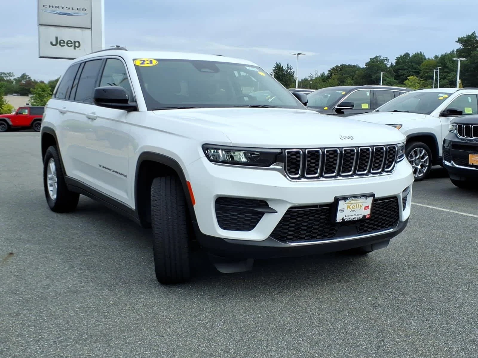 Used 2023 Bright White Clearcoat Jeep Laredo image 5