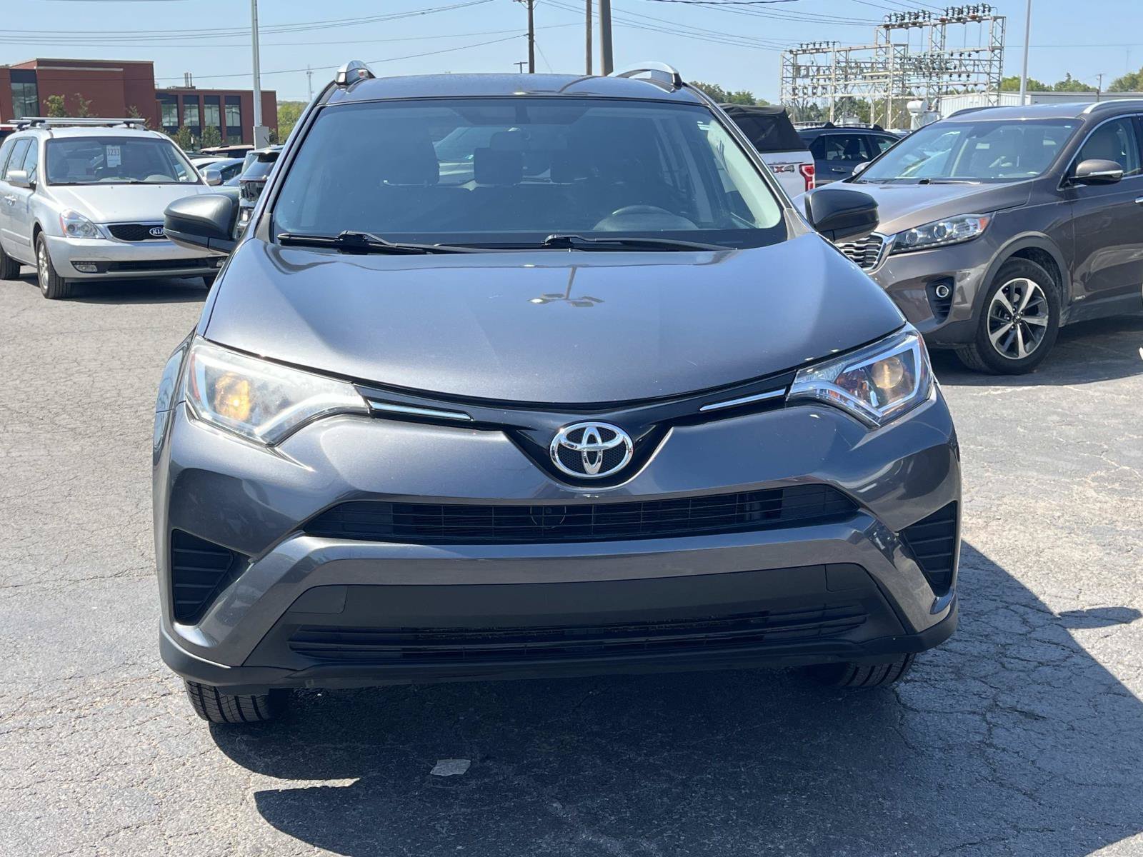 Used 2016 Magnetic Gray Metallic Toyota LE image 2