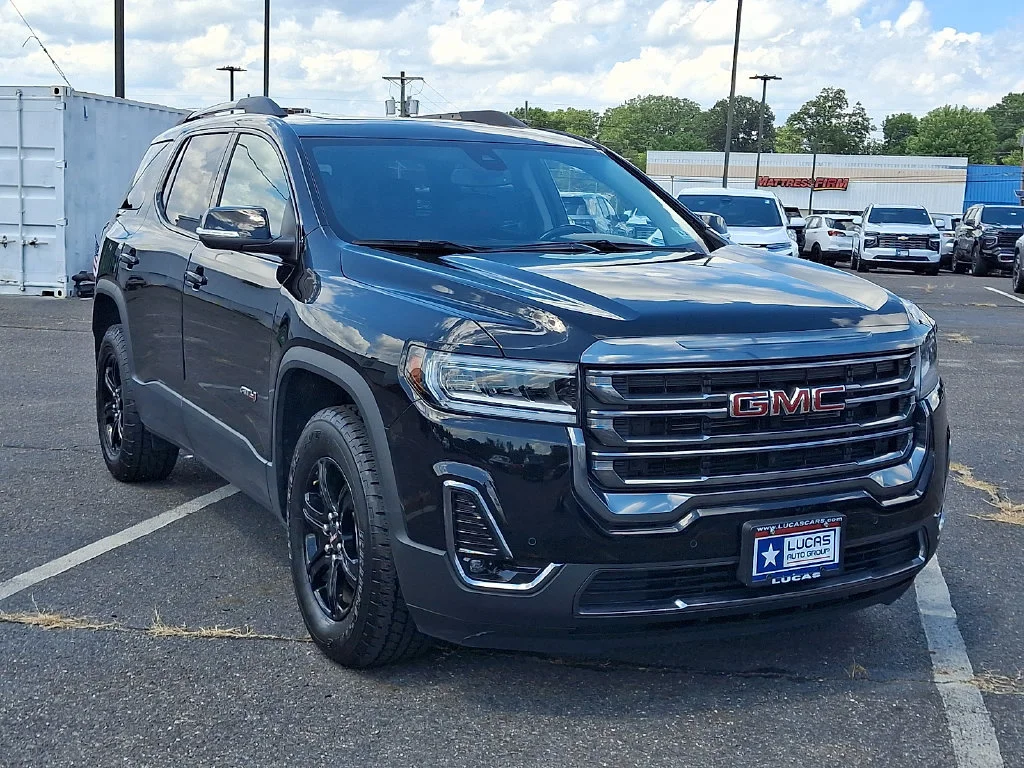 Used 2023 Ebony Twilight Metallic GMC AT4 image 2