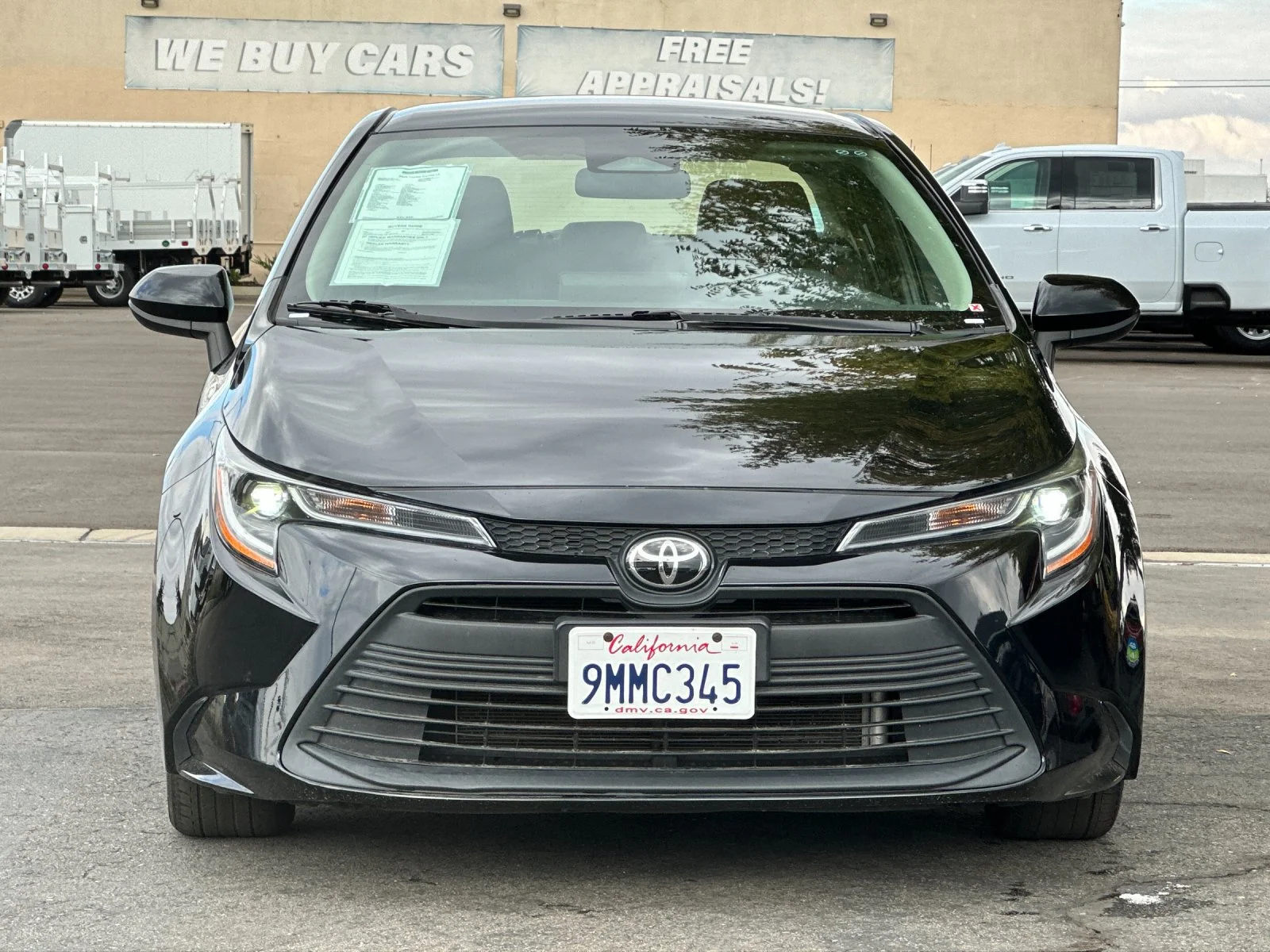 Used 2024 Black Toyota LE image 8