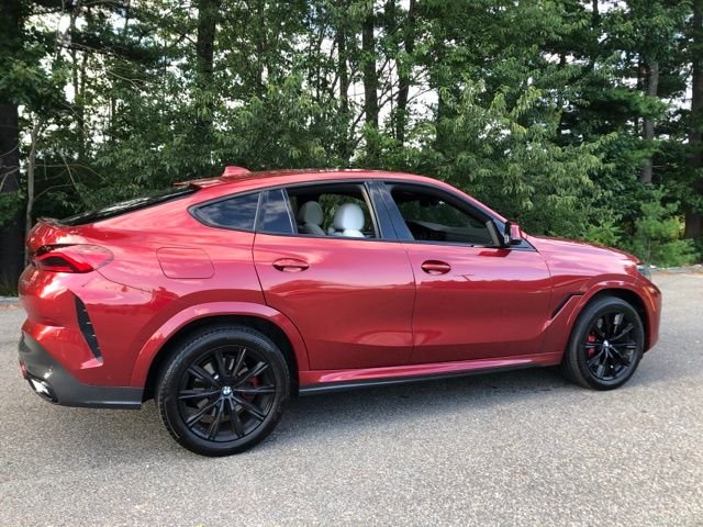 Used 2023 Flamenco Red Metallic BMW xDrive40i image 4