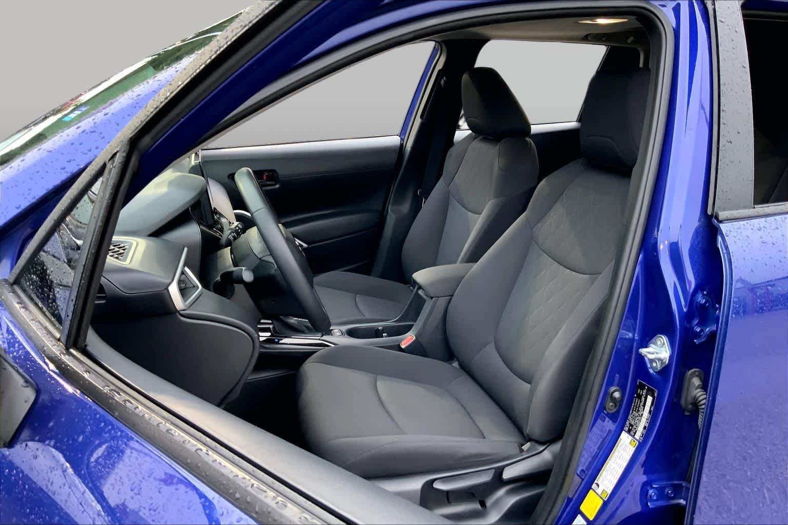 Used 2024 Blue Crush Metallic Toyota LE image 8