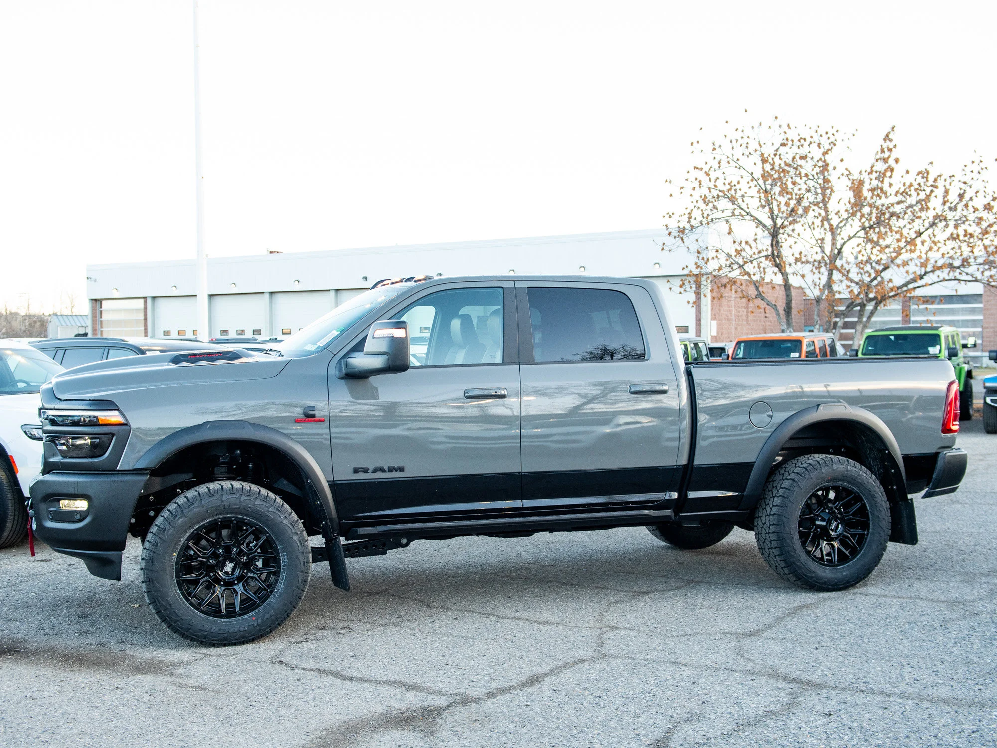 Used 2026 Grey RAM Rebel*, 2 Inch Lift, 35 Inch Tires, Winch, Trigger Industries MudFlaps image 3